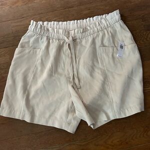 New with tags size medium woman’s dare string beige shorts